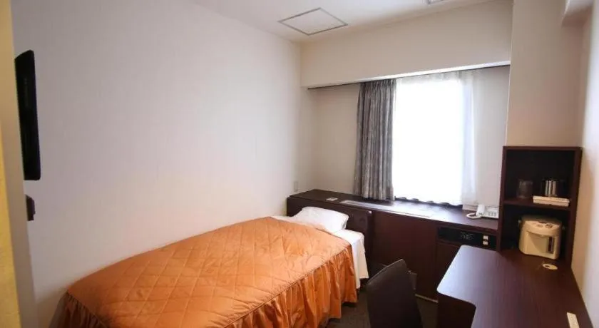 Bed in Hotel Suncity Ikebukuro