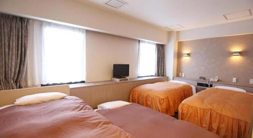 Bed in Hotel Suncity Ikebukuro