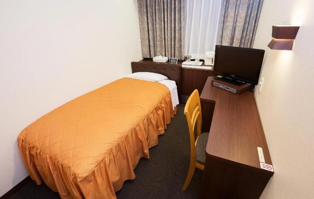 Bed in Hotel Suncity Ikebukuro