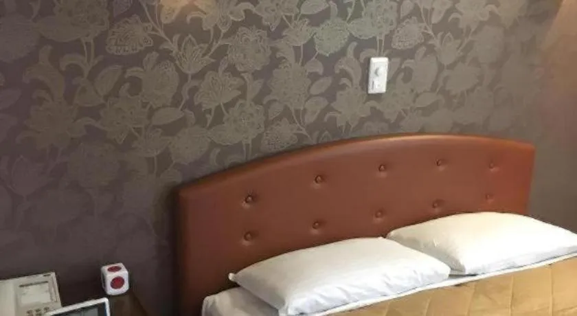 Bed in Hotel Suncity Ikebukuro