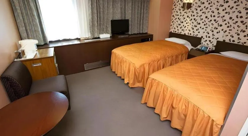 Bed in Hotel Suncity Ikebukuro