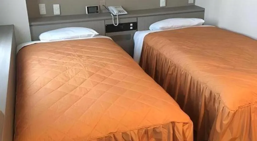 Bed in Hotel Suncity Ikebukuro