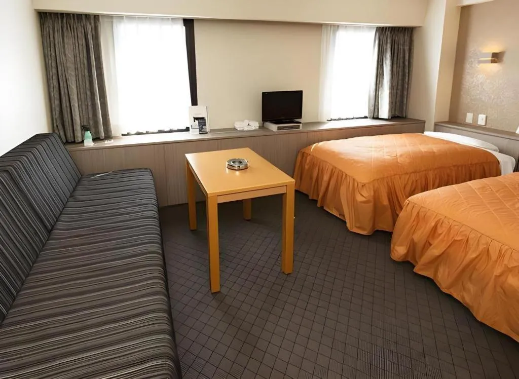 Bed in Hotel Suncity Ikebukuro