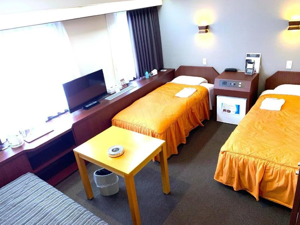 Bed in Hotel Suncity Ikebukuro