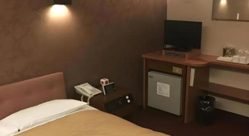 Bed in Hotel Suncity Ikebukuro