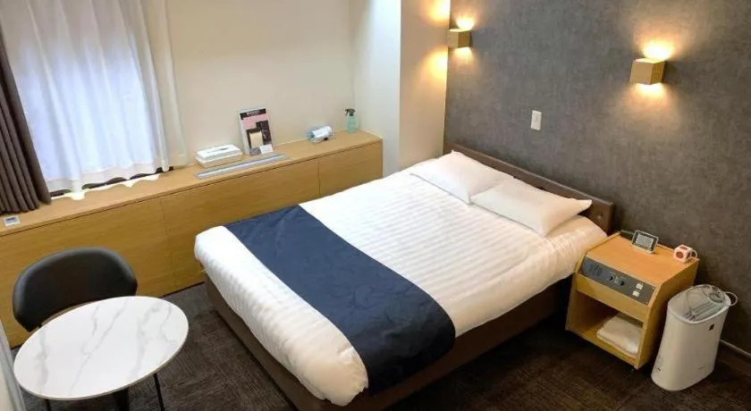 Bed in Hotel Suncity Ikebukuro