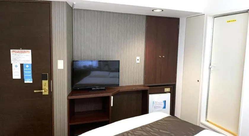 Bed in Hotel Suncity Ikebukuro