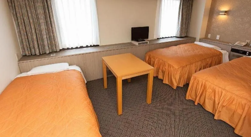 Bed in Hotel Suncity Ikebukuro