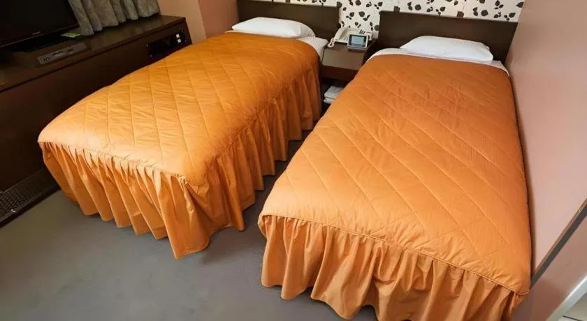 Bed in Hotel Suncity Ikebukuro