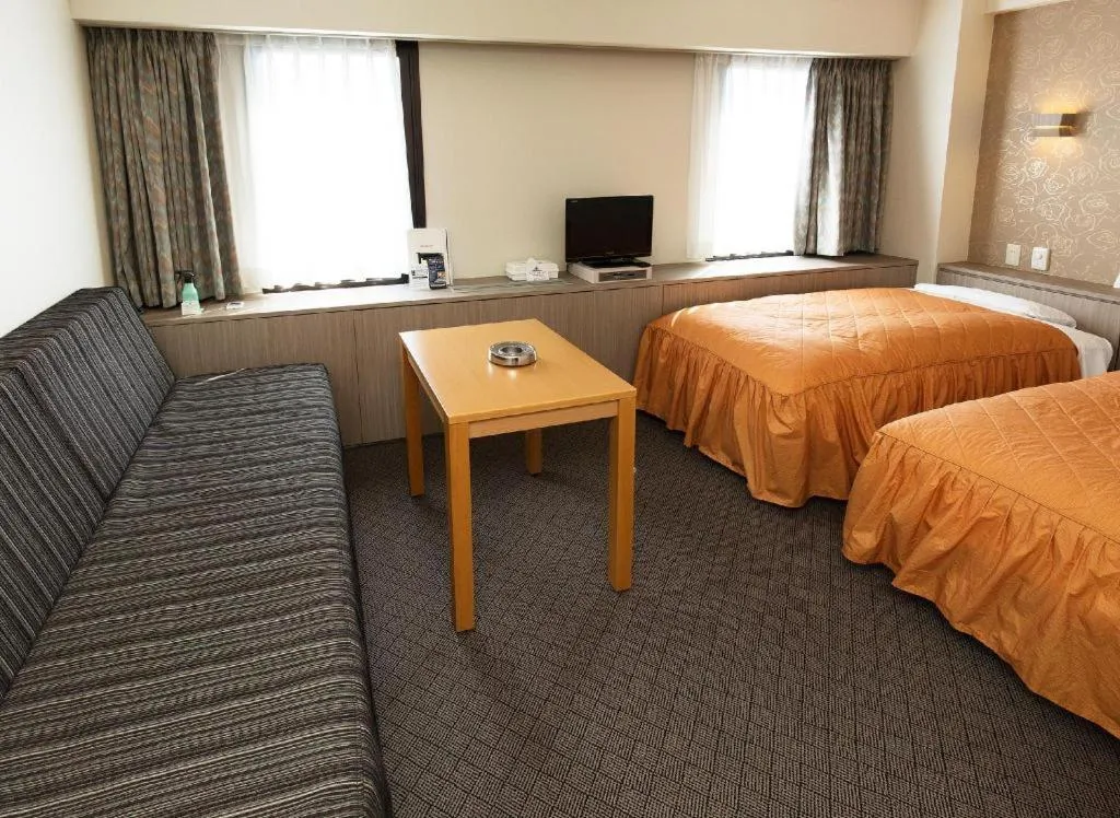 Bed in Hotel Suncity Ikebukuro