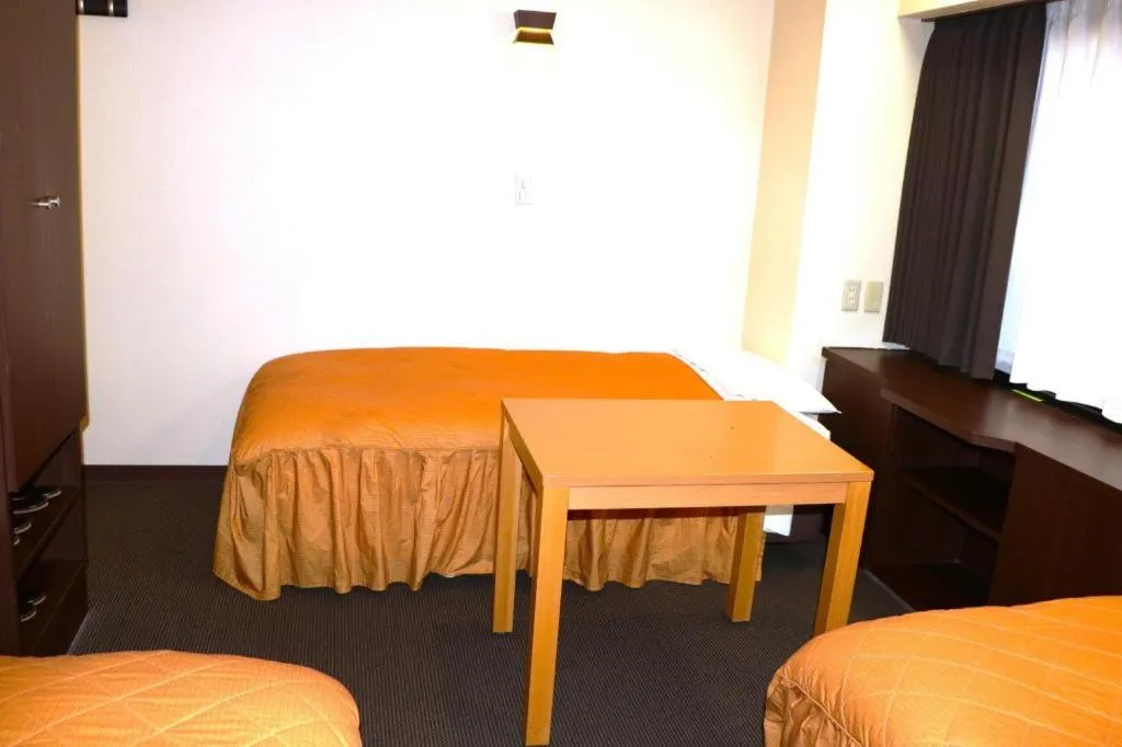 Bed in Hotel Suncity Ikebukuro