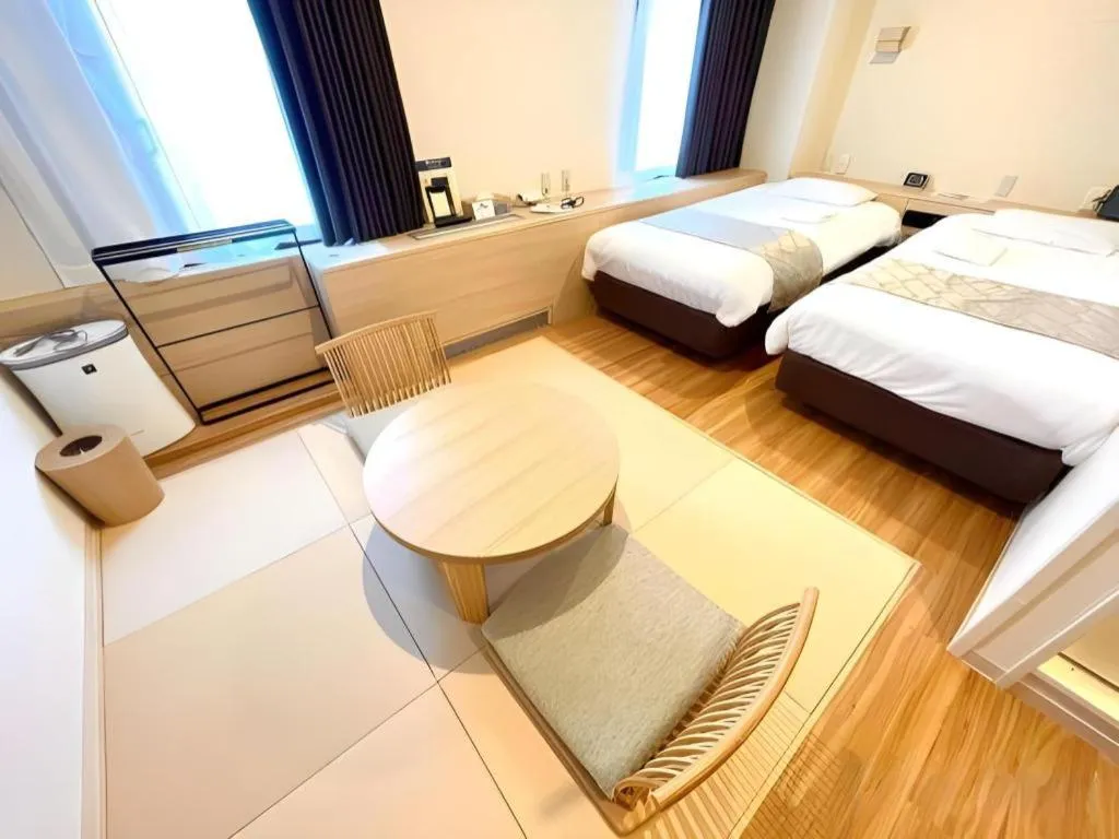 Bed in Hotel Suncity Ikebukuro