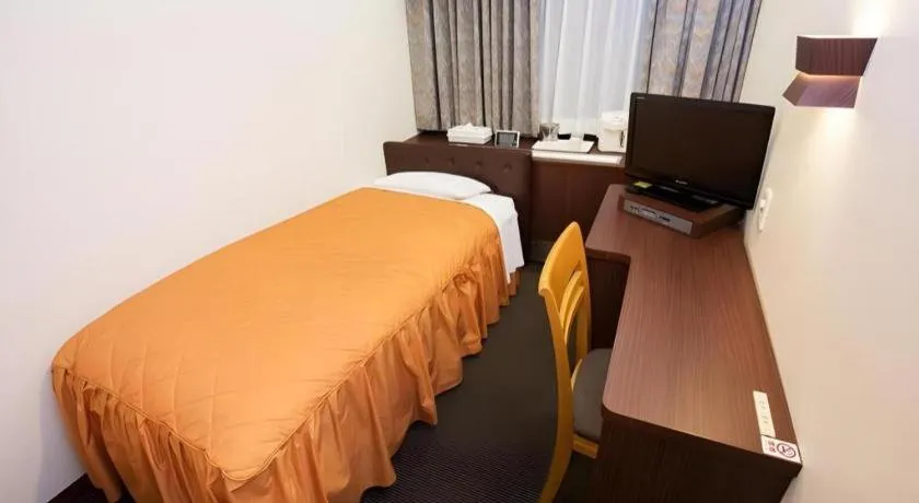 Bed in Hotel Suncity Ikebukuro