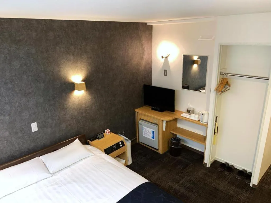 Bed in Hotel Suncity Ikebukuro