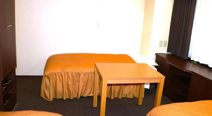 Bed in Hotel Suncity Ikebukuro