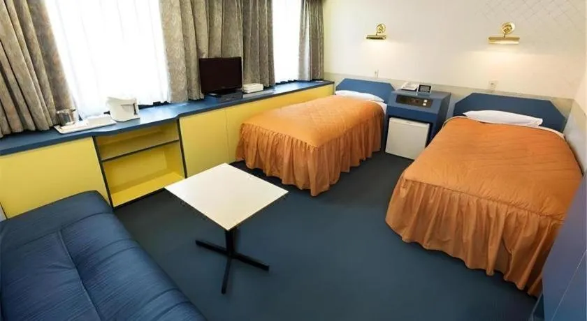 Bed in Hotel Suncity Ikebukuro