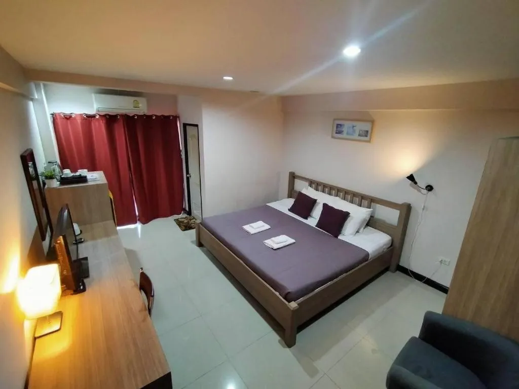 Bed in Home Place Lopburi Hotel