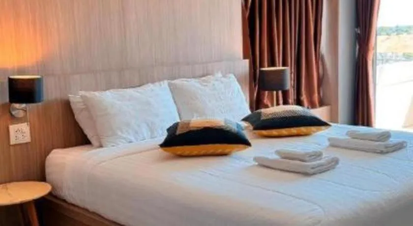 Bed in Home Place Lopburi Hotel