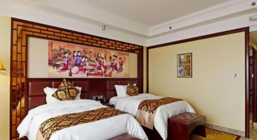 Bed in Wanjiale International Hotel