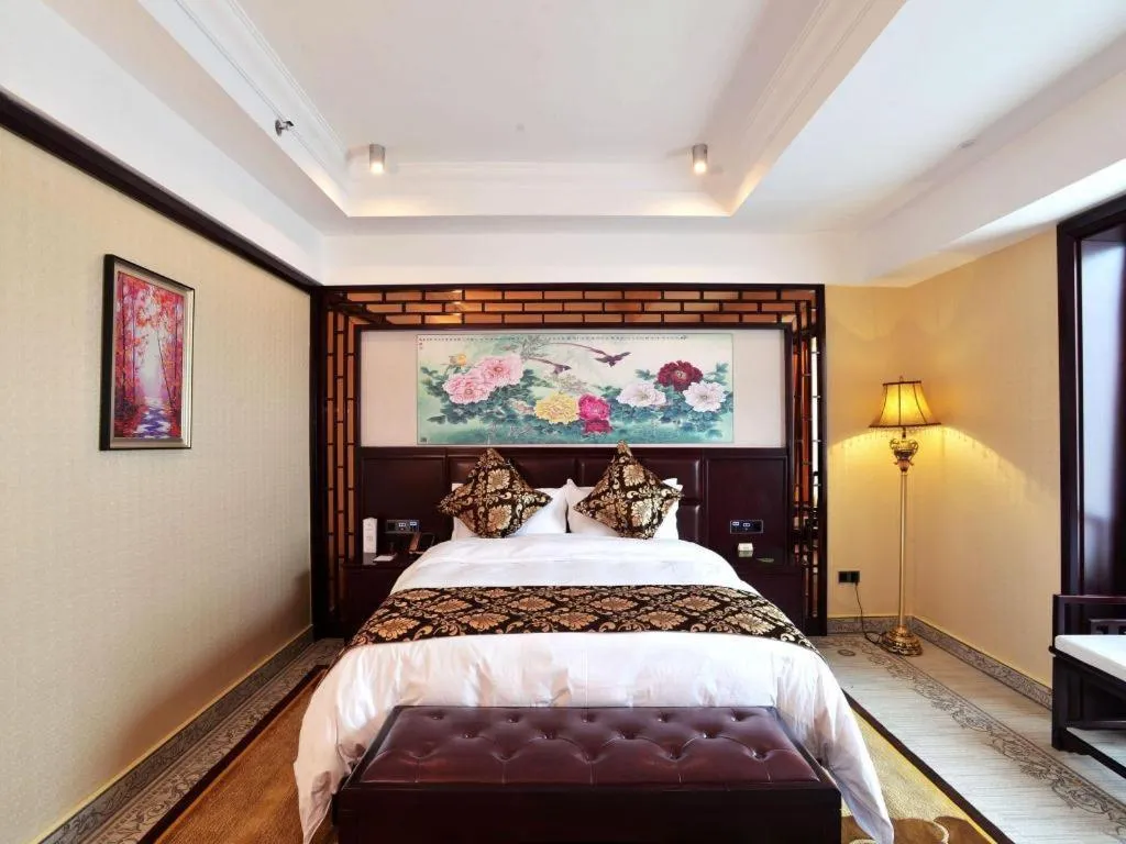 Bed in Wanjiale International Hotel