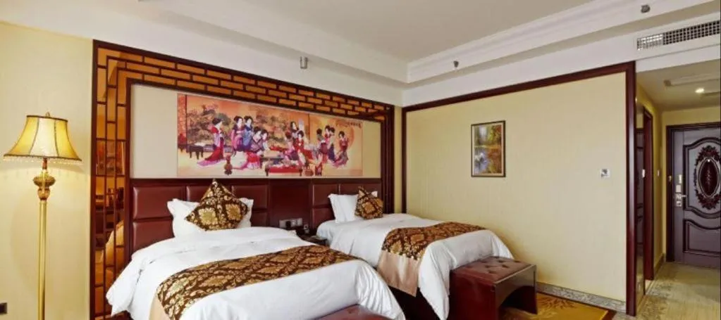 Bed in Wanjiale International Hotel