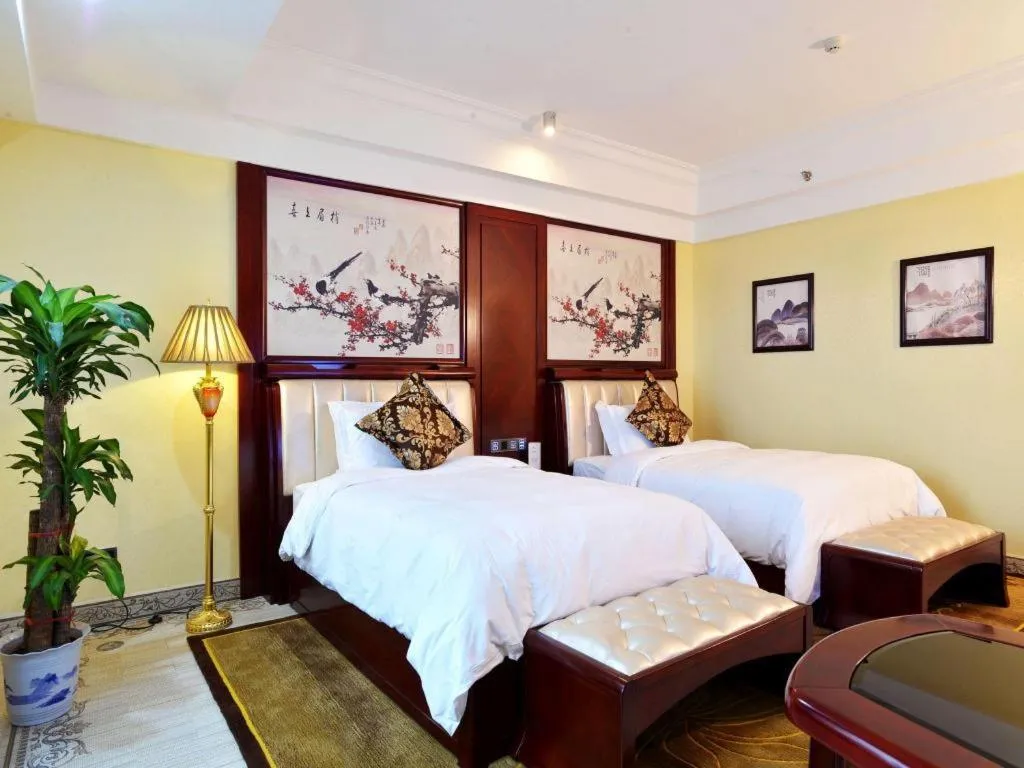 Bed in Wanjiale International Hotel