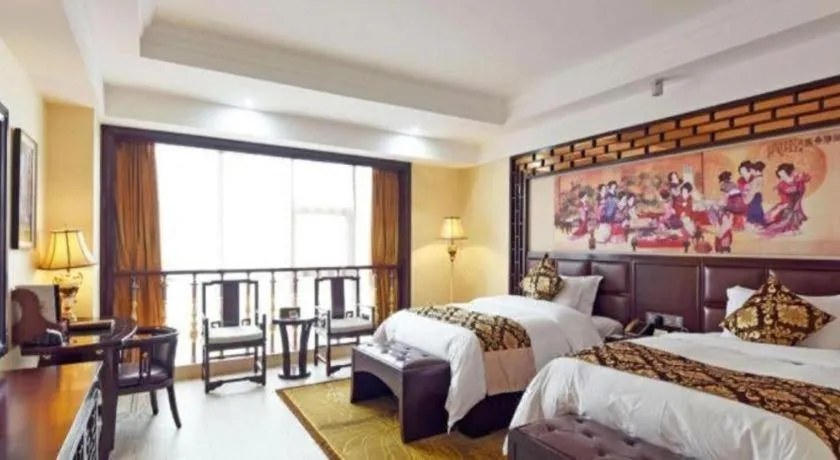 Bed in Wanjiale International Hotel