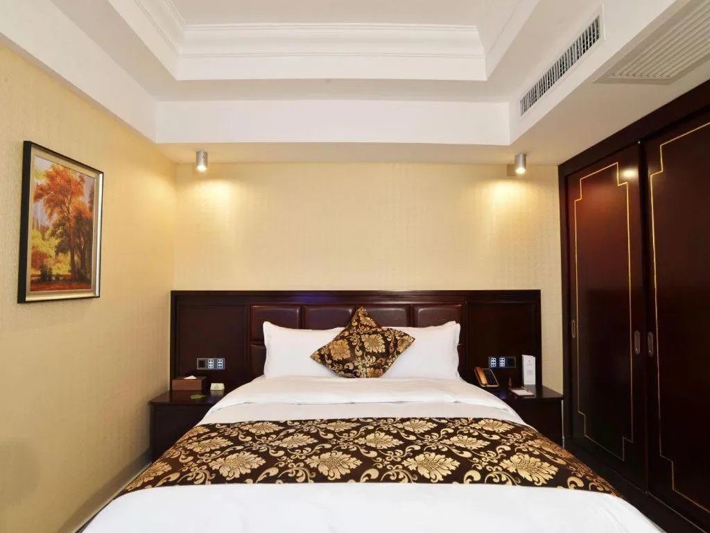 Bed in Wanjiale International Hotel