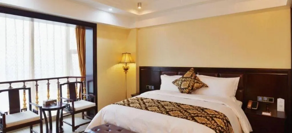 Bed in Wanjiale International Hotel