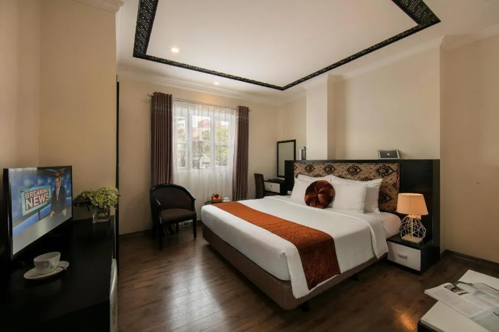 Bed in Serenity Premier Hotel