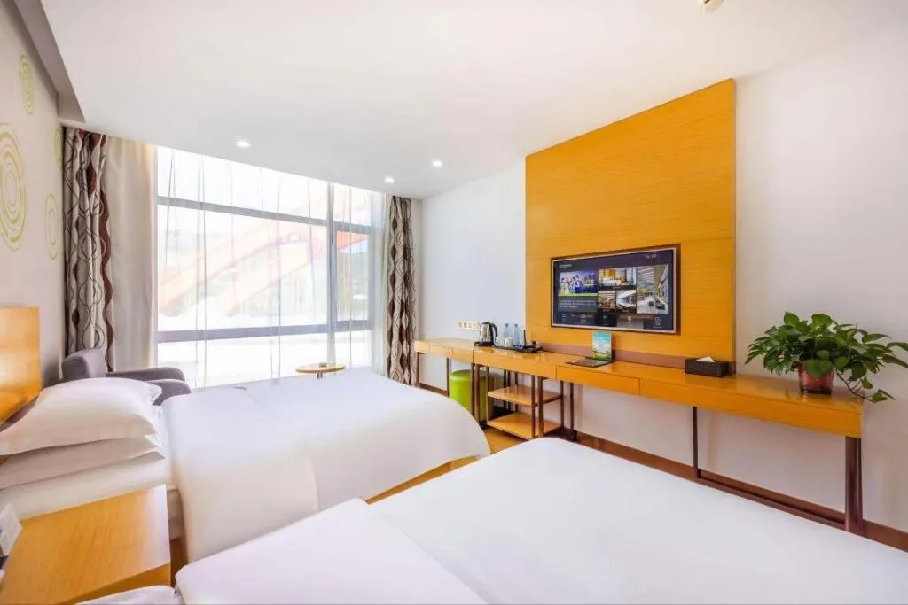 Bed in GreenTree Inn Linxia Niujinhe Avenue Express Hotel