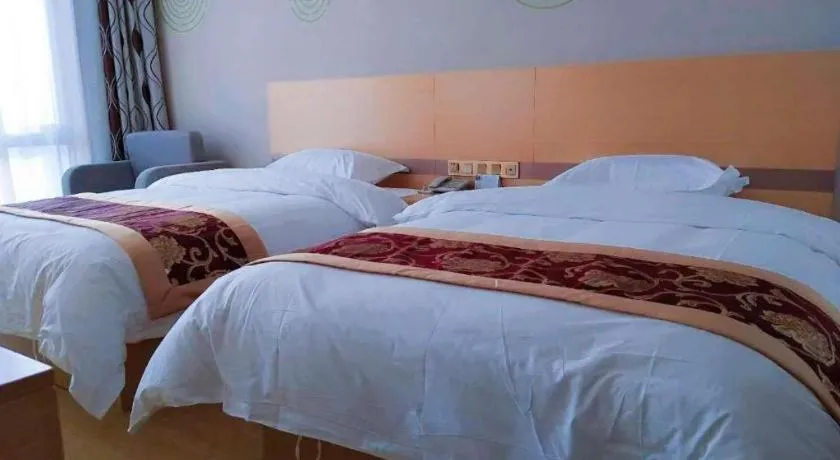 Bed in GreenTree Inn Linxia Niujinhe Avenue Express Hotel