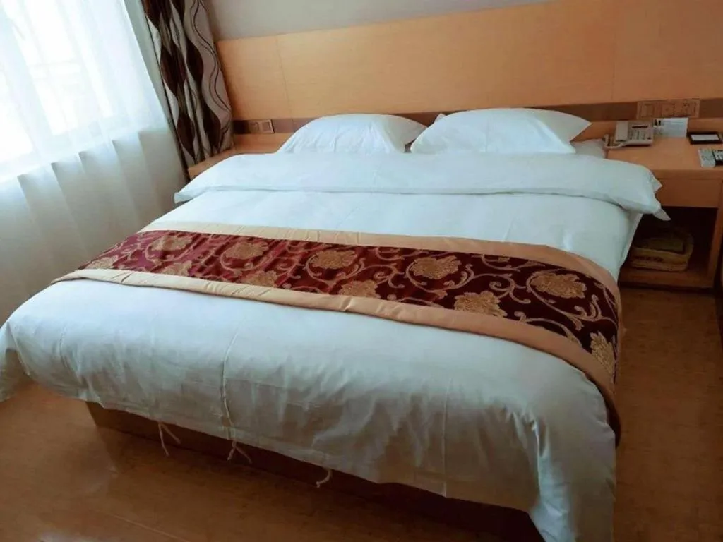 Bed in GreenTree Inn Linxia Niujinhe Avenue Express Hotel