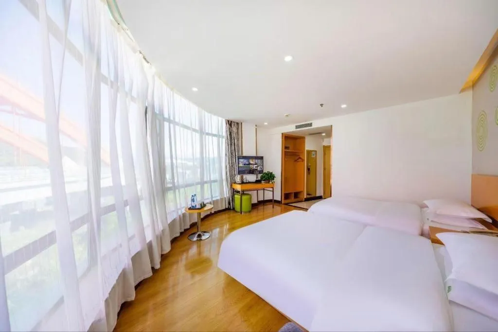 Bed in GreenTree Inn Linxia Niujinhe Avenue Express Hotel