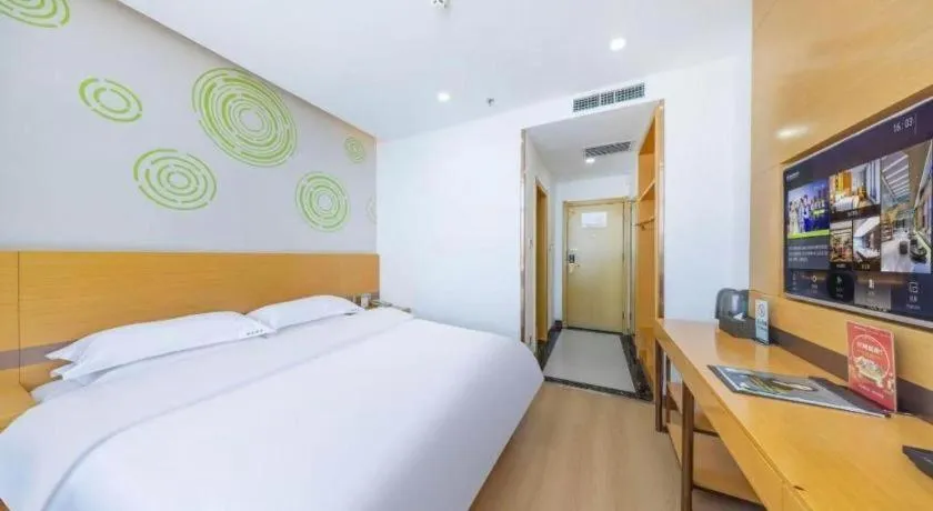 Bed in GreenTree Inn Linxia Niujinhe Avenue Express Hotel