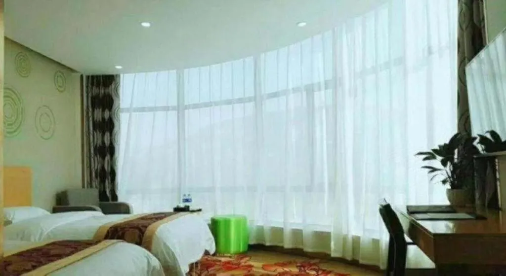 Bed in GreenTree Inn Linxia Niujinhe Avenue Express Hotel