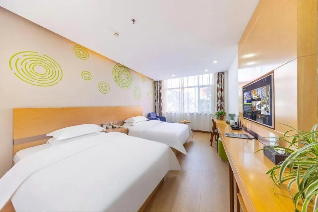 Bed in GreenTree Inn Linxia Niujinhe Avenue Express Hotel