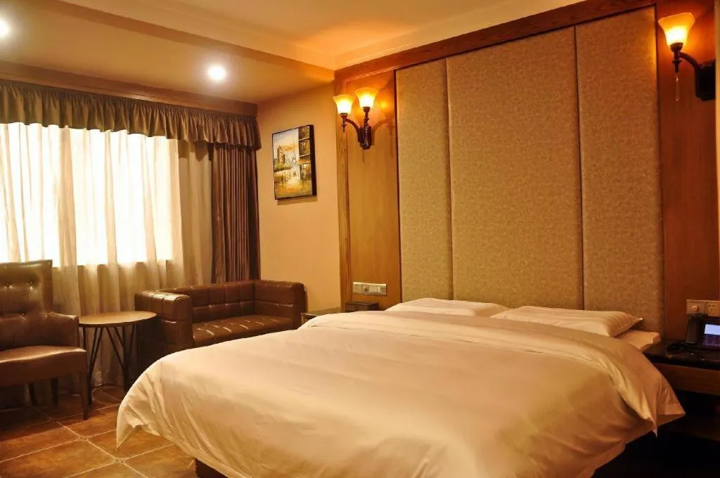 Bed in LINCOLN CARNIVAL HOTEL