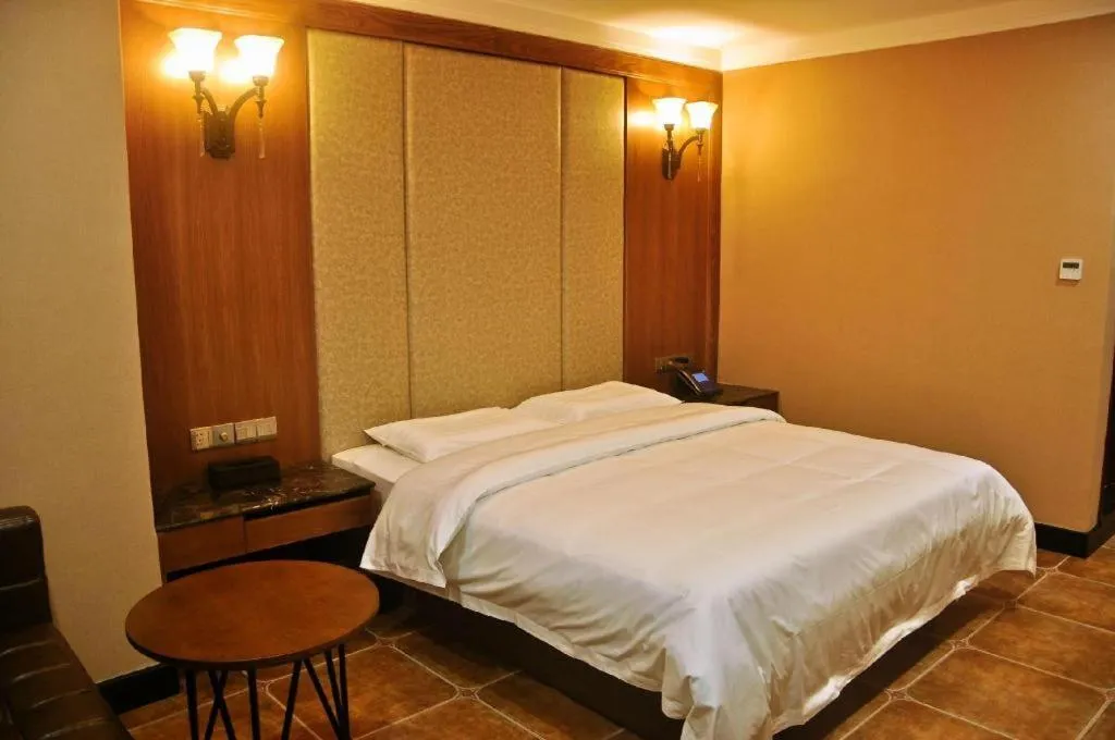 Bed in LINCOLN CARNIVAL HOTEL