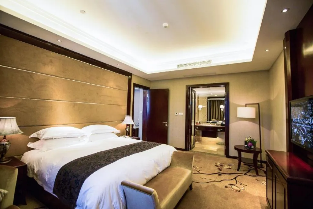 Bed in Taishun Xiangzhou New Century Hotel