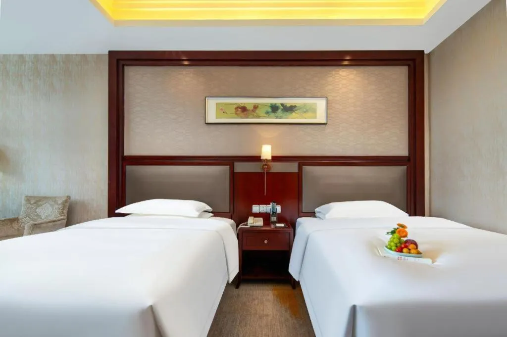 Bed in Taishun Xiangzhou New Century Hotel