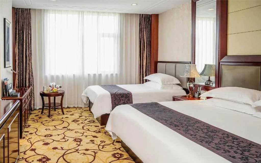 Bed in Taishun Xiangzhou New Century Hotel