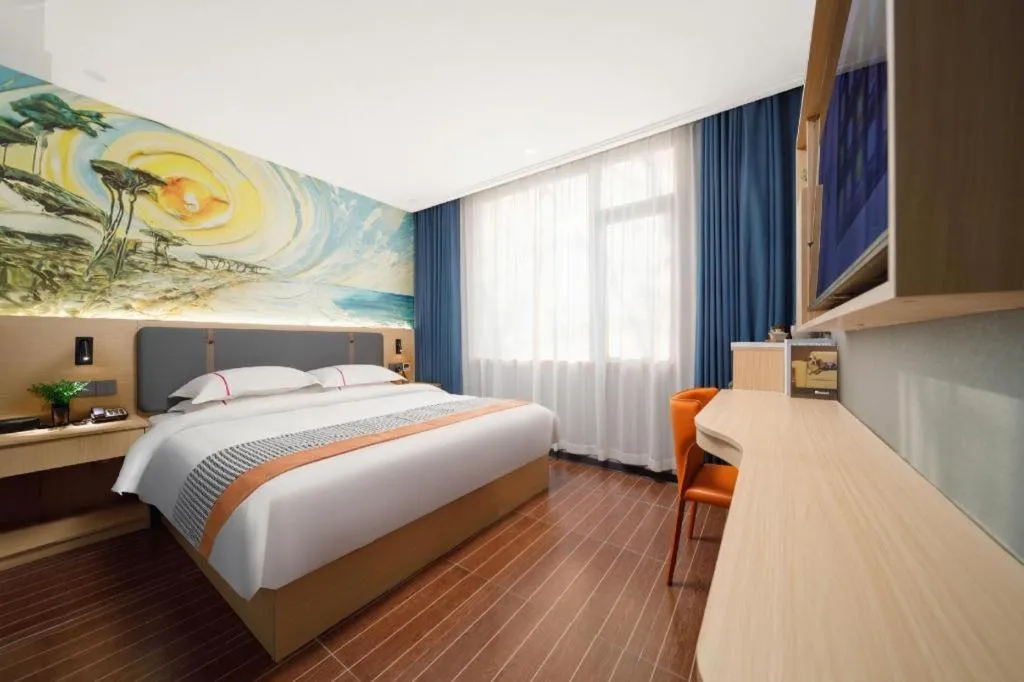 Bed in JIAN AI XI YUE HOTEL