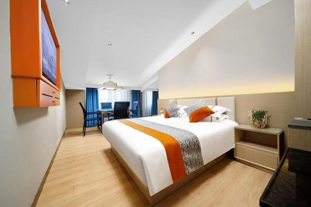 Bed in JIAN AI XI YUE HOTEL