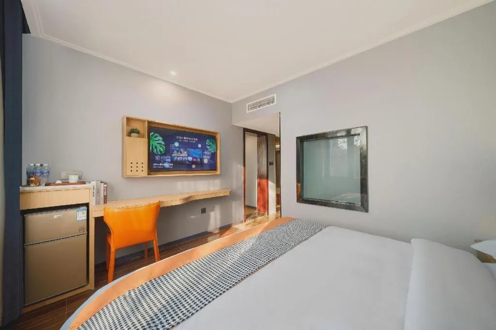 Bed in JIAN AI XI YUE HOTEL