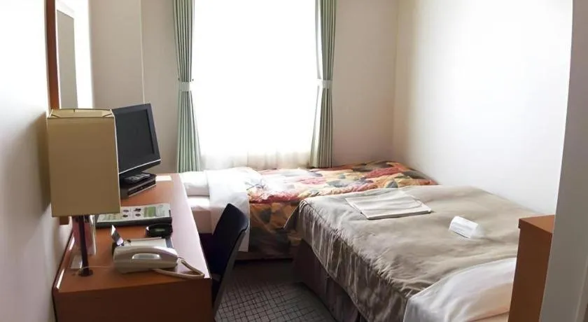 Bed in Sapporo Hotel Yamachi