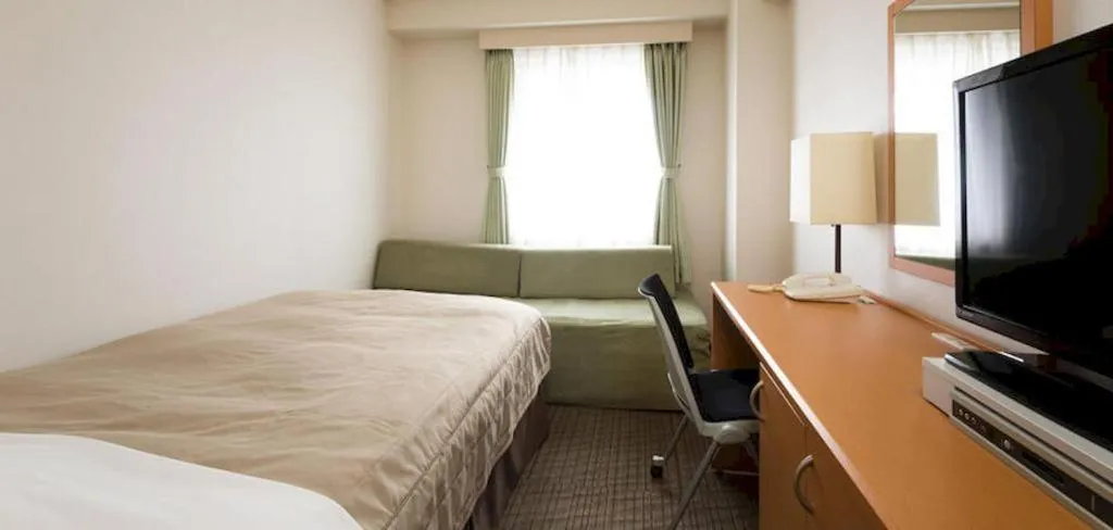 Bed in Sapporo Hotel Yamachi