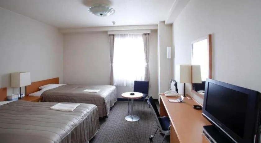 Bed in Sapporo Hotel Yamachi