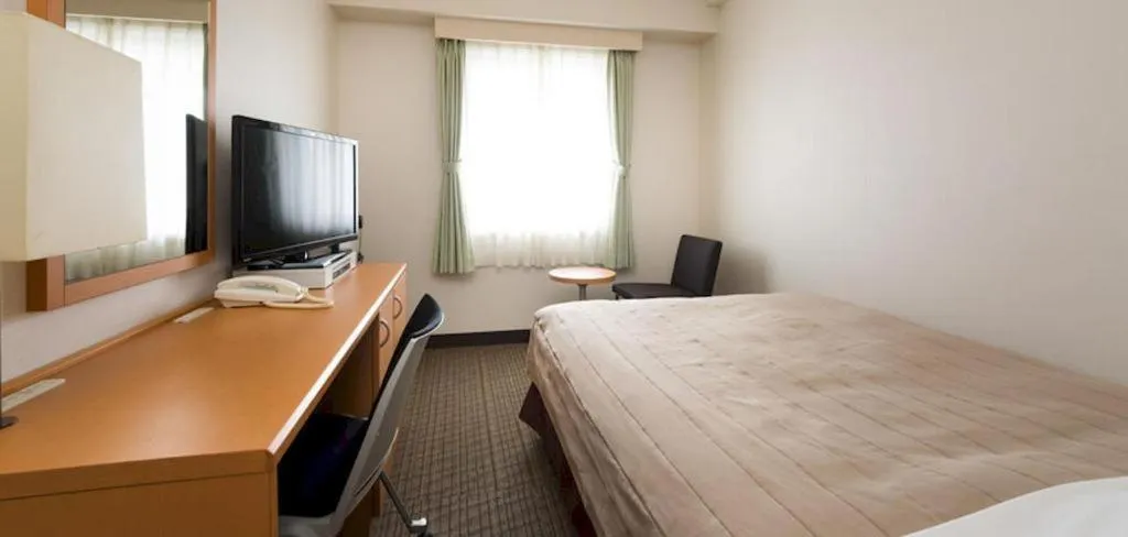 Bed in Sapporo Hotel Yamachi