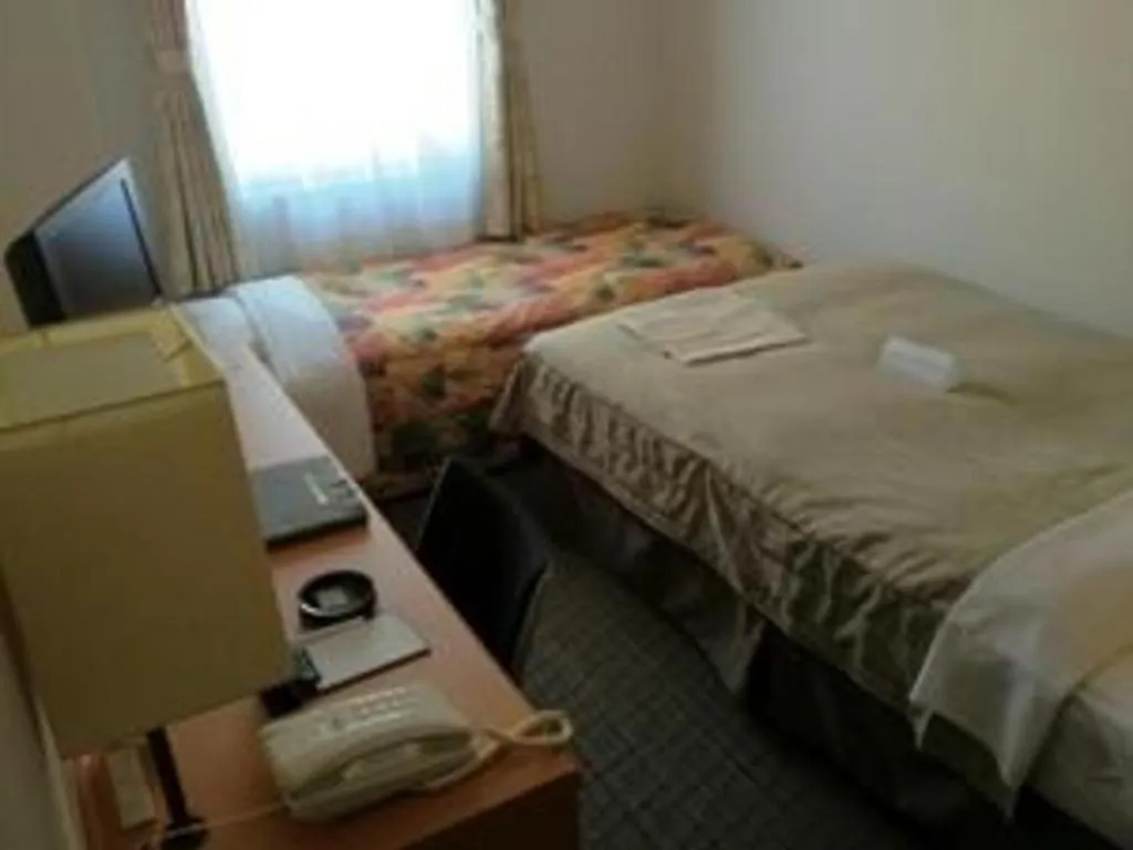 Bed in Sapporo Hotel Yamachi